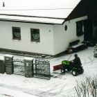 Schneeraeumen-mit-Traktor